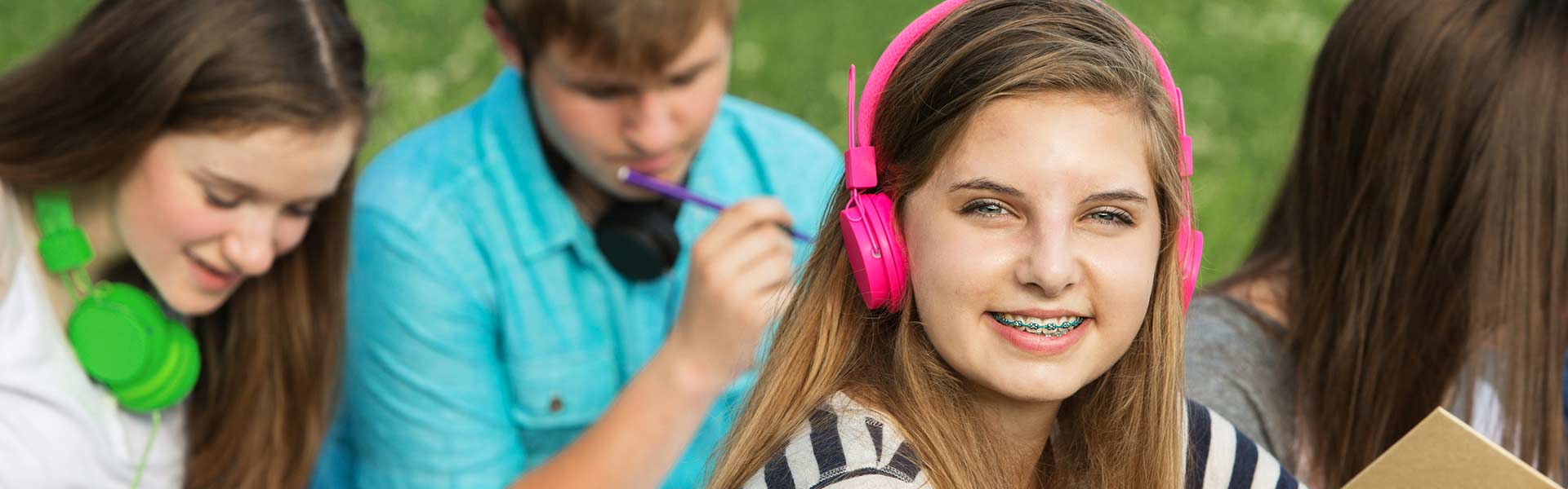 Sliders-Teen-Girl-with-Braces Hrabowy Orthodontics in Columbus and Grove City OH